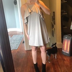 Shimmery gold mini dress with ruffled high neck